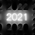 Luminous 2021 number on wall. New Year concept