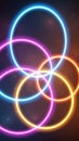 Interlocking glowing neon rings in blue pink and yellow forming a symmetrical pattern with a soft bokeh background and subtle Royalty Free Stock Photo