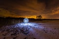 Luminous sphere near the lake