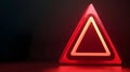 A luminous, triangular object with a glowing inner outline against a dark background.