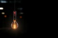 A luminous white light probe hangs in a 3D rendered dark room