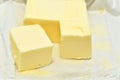Butter cube-shaped pieces. Royalty Free Stock Photo