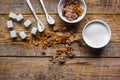 Lumps of white and brown sugar on wooden table background top view mock up Royalty Free Stock Photo