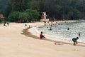 Lumut Perak, Malaysia - September 16, 2019: People swimming at beach of Teluk Batik. Teluk Batik Beach is located at Lumut and