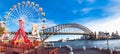 Luna park wheel with harbour bridge arch in Sydney, Australia.