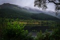 Lunaig lake in Loch Lomond and The Trossachs National Park on a foggy day, Highlands, Scotland Royalty Free Stock Photo