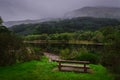 Lunaig lake in Loch Lomond and The Trossachs National Park on a foggy day, Highlands, Scotland Royalty Free Stock Photo