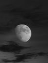 Lunar eclipse whit clouds in blue hour Royalty Free Stock Photo