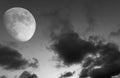 Lunar eclipse whit clouds in blue hour Royalty Free Stock Photo