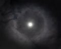 Lunar halo ring around the moon in night time sky with stars in Australia Royalty Free Stock Photo