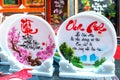 Lunar New Year Calligraphy decorated with text `happy place family reunion ethics` in Vietnamese