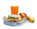 Lunch box with appetizing food and glass Royalty Free Stock Photo