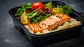 Lunch box containers with grilled salmon fish fillet, rice and salad Royalty Free Stock Photo