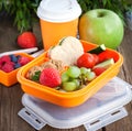 Lunch box with sandwich, cookies, veggies and fruits Royalty Free Stock Photo