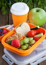 Lunch box with sandwich, cookies, veggies and fruits Royalty Free Stock Photo