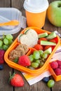 Lunch box with sandwich and fruits Royalty Free Stock Photo