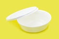 Lunch box, styrofoam pot or dish called marmitex, for transport and PACKAGING FOOD, copy space, yellow background