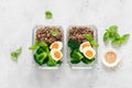 Lunch boxes with broccoli, quinoa and egg, healthy food, balanced eating concept