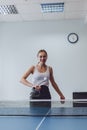 Lunch break activities concept. Office games during Lunch break. Attractive young Business woman playing ping pong, table tennis Royalty Free Stock Photo