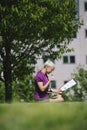 Lunch break with business person eating vegetable in park Royalty Free Stock Photo