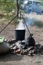 Lunch cooked over an open campfire Royalty Free Stock Photo