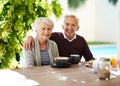 Lunch dates with my better half are always memorable. Portrait of an affectionate senior couple enjoying a meal together Royalty Free Stock Photo