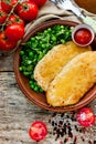 Lunch dish - chicken cheese schnitzel with lettuce green peas sa Royalty Free Stock Photo