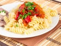 Lunch dish of Italian pasta and vegetable sauce