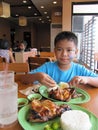 Lunch at Mang Inasal, one of the famous fast food in Philippines, main dish is chicken inasal, my son favorite