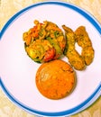 Lunch plate. Portion control. A side of brussels sprout medley one cup. Two strips baked chicken. A cup of ewa riro oloyin.