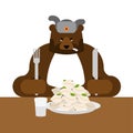 Lunch in Russia. Angry Russian Bear eats dumplings. Traditional Russian food