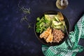 Lunch salad. Buddha bowl with buckwheat porridge, grilled chicken fillet, corn salad, microgreens and daikon. Healthy food. Top Royalty Free Stock Photo