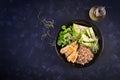 Lunch salad. Buddha bowl with buckwheat porridge, grilled chicken fillet, corn salad, microgreens and daikon. Healthy food. Top Royalty Free Stock Photo