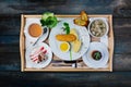 Lunch set. Dumplings, chicken cutlet with mashed potato and russian herring salad, served with the cutlery. Royalty Free Stock Photo