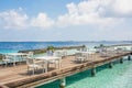 Lunch setup with tables and chairs at the tropical island Royalty Free Stock Photo