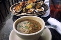 Lunch on the table, soup and baked oysters