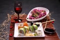 Lunch with wine, sushi and chop stik Royalty Free Stock Photo