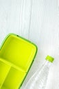 Lunchbox and water for healthy food dinner at school white table background top view mockup Royalty Free Stock Photo