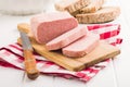 Luncheon meat on cutting board Royalty Free Stock Photo