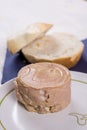 Luncheon meat on the plate with bread in the background Royalty Free Stock Photo