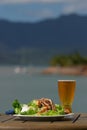 Lunchtime salad & cold beer Royalty Free Stock Photo