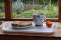 A lunchtime snack in a garden shed during a welcome break from work in the garden Royalty Free Stock Photo