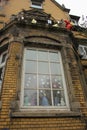 Luneburg, Germany - 10.12.2017: Traditional facades of medieval houses. Decorated for Christmas doors and windows