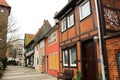 Luneburg, Germany - 10.12.2017: Traditional facades of medieval houses. Decorated for Christmas doors and windows