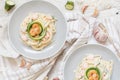 Lunguini shrimps and zucchini with cream Royalty Free Stock Photo