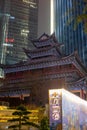 Luohan Temple among high-rise buildings at nightÃ¯Â¼Å Chongqing, China