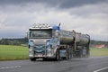 Customized Scania Tank Truck Trucking in Rain Royalty Free Stock Photo