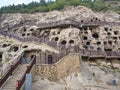 Luoyang Longmen grottoes. Broken Buddha and the stone caves and sculptures in the Longmen Grottoes in Luoyang, China. Taken in