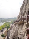 Luoyang Longmen grottoes. Broken Buddha and the stone caves and sculptures in the Longmen Grottoes in Luoyang, China. Taken in