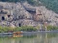 Luoyang Longmen grottoes. Broken Buddha and the stone caves and sculptures in the Longmen Grottoes in Luoyang, China. Taken in